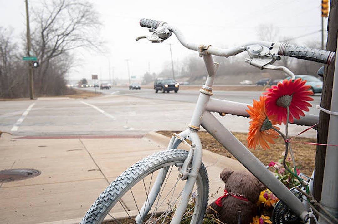 Image of  roadside memorial - bike and flowers