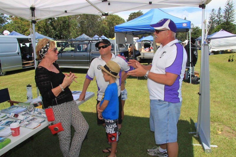 Residents at the Pottsville Beach Markets take the opportunity to speak to Councillor Joan van Lieshout at the Councillors' Community Catch-up.