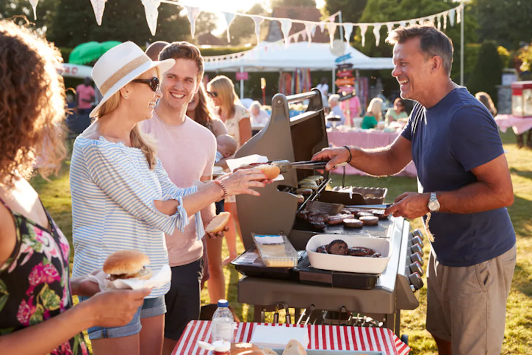 People at a community sausage sizzle