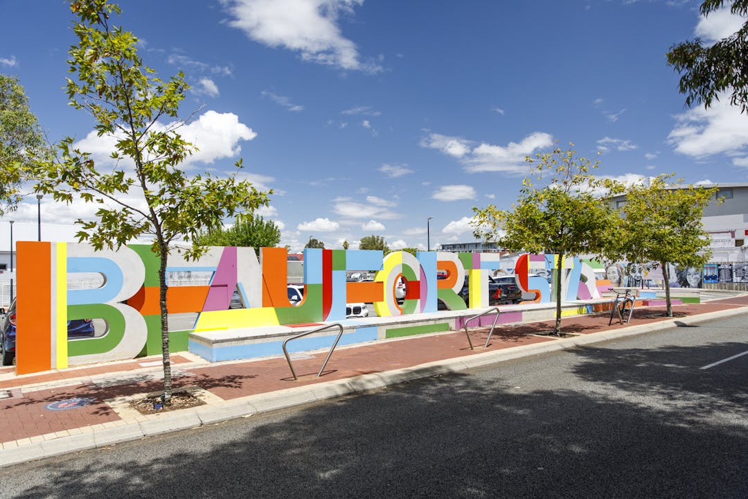 Sculpture of coloured letters spelling out Beaufort Street.