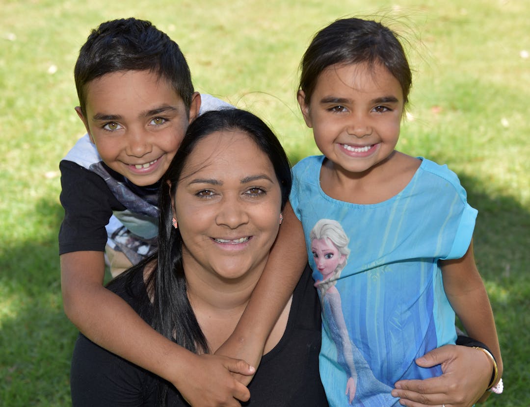 Mother with daughter and son in the park