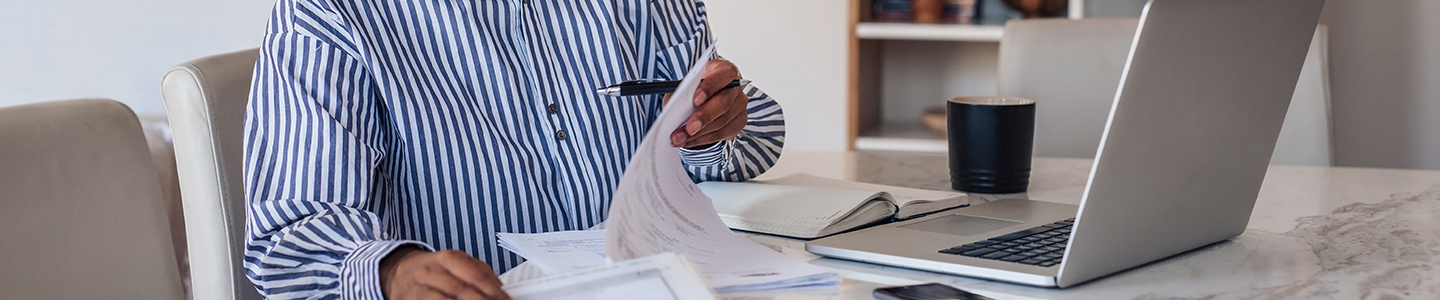 Women working on a laptop from home
