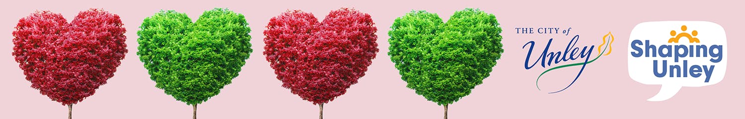 Red and green heart shaped trees alternating in a row