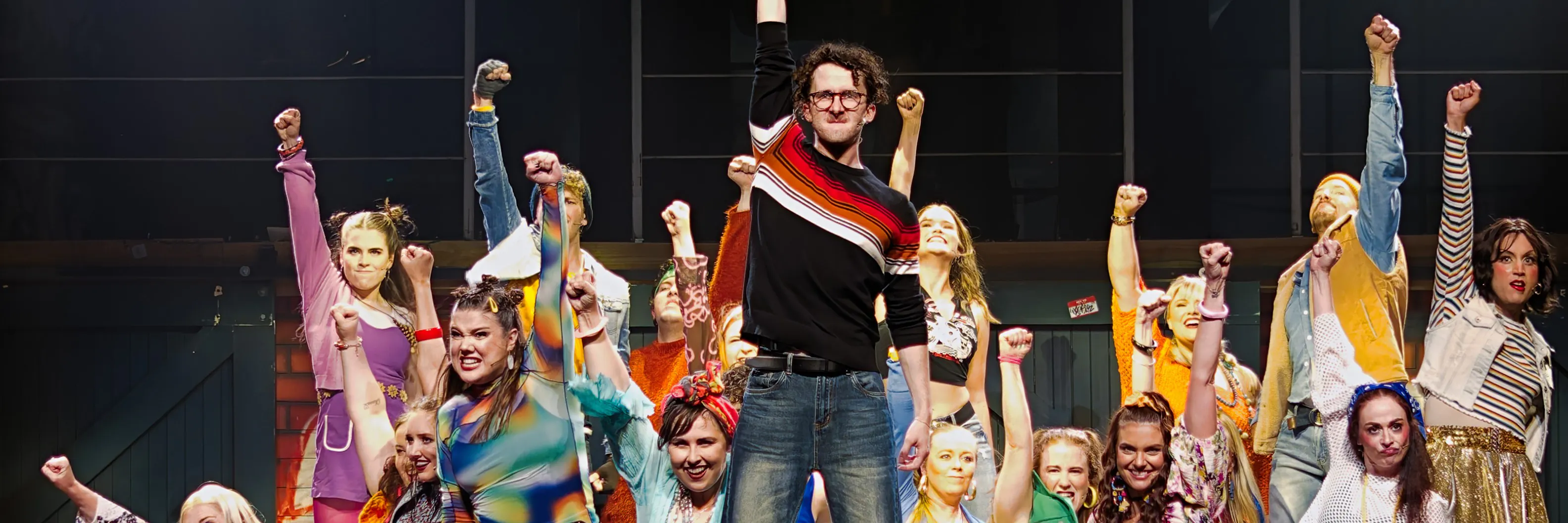 Photo by John Loch of the RENT cast performing at the Pilbeam Theatre in Rockhampton