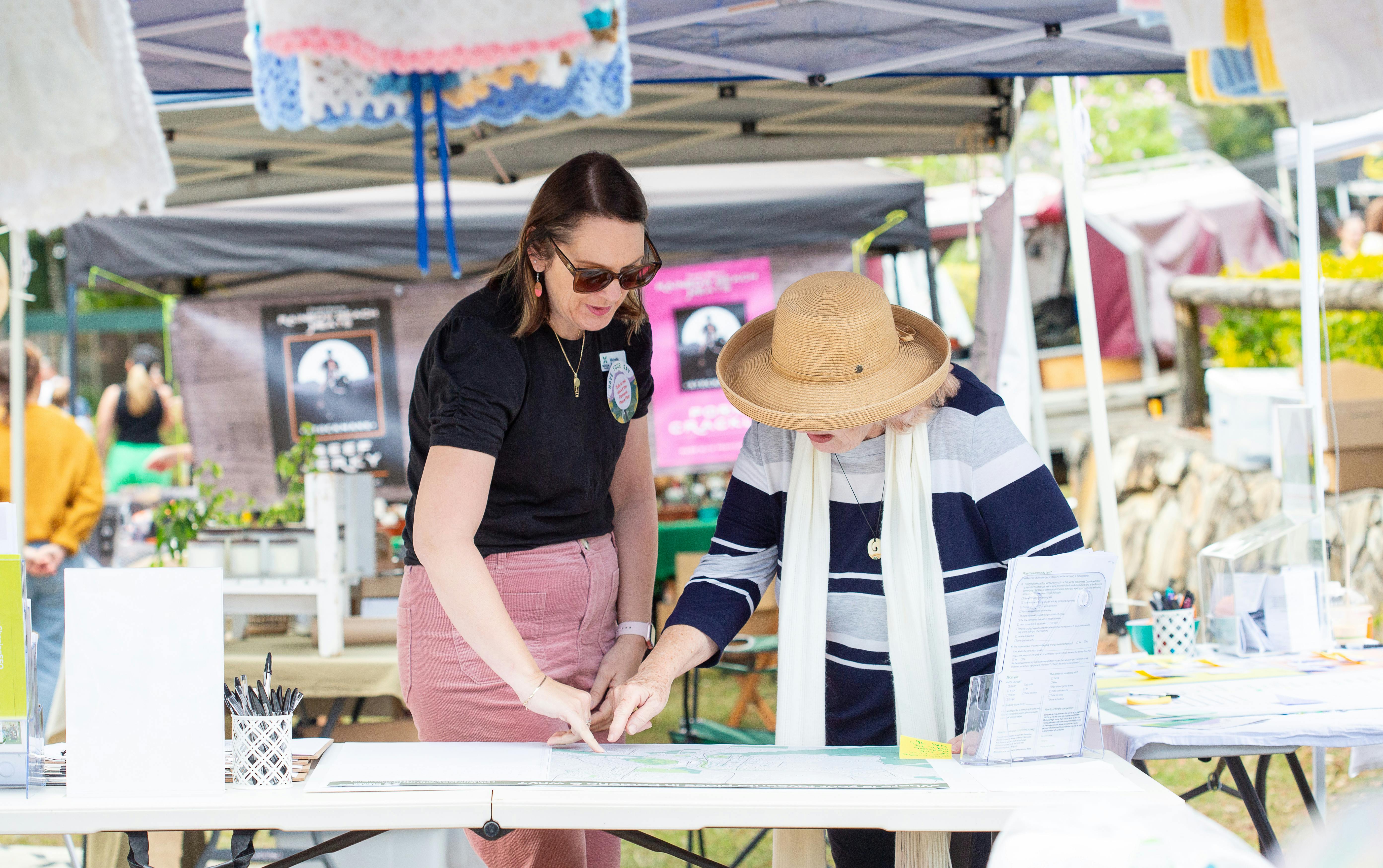 Engaging people at the Pomona Markets. Image courtesy of Kylie Harber Photography.