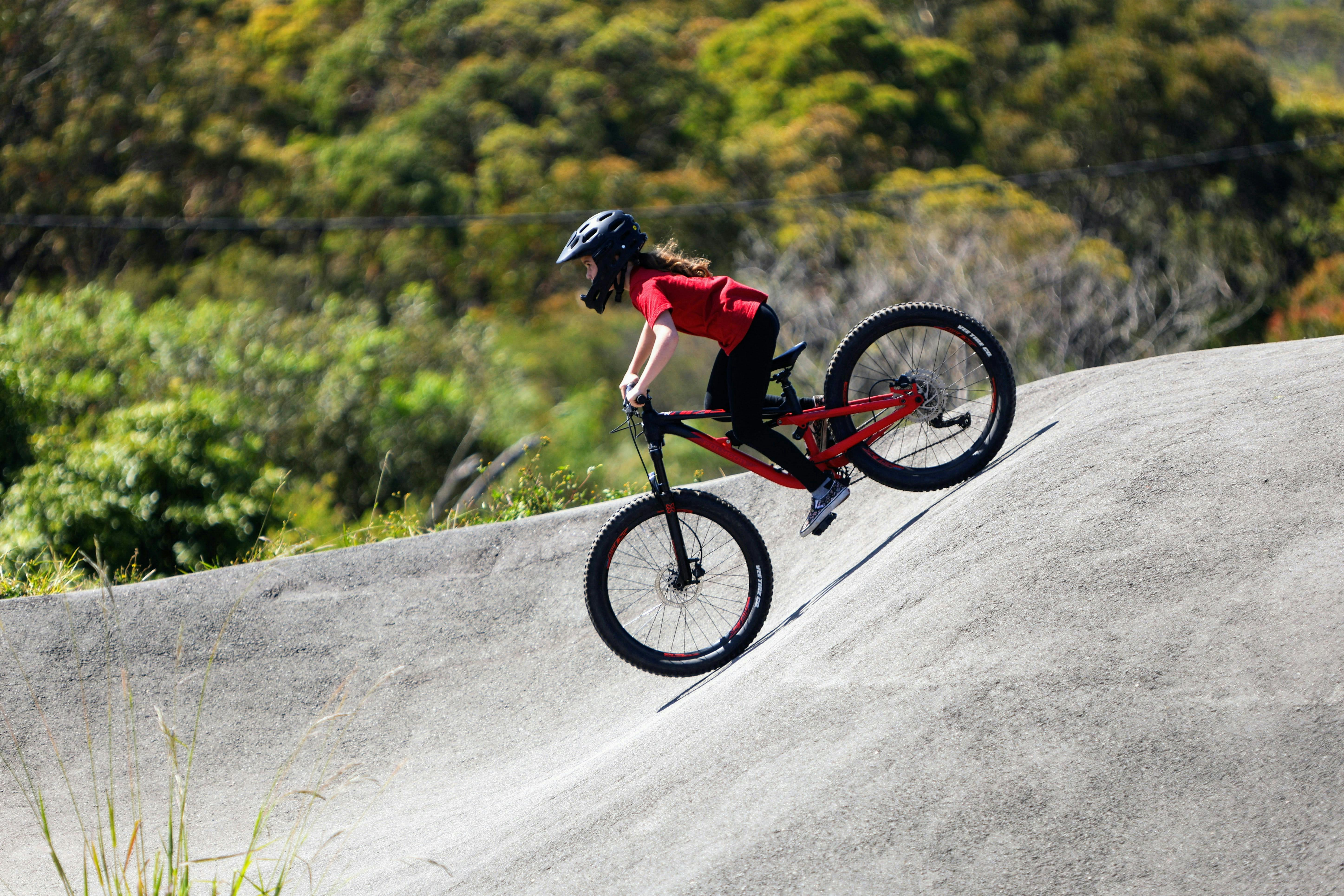 Small girl on bmx bicycle 