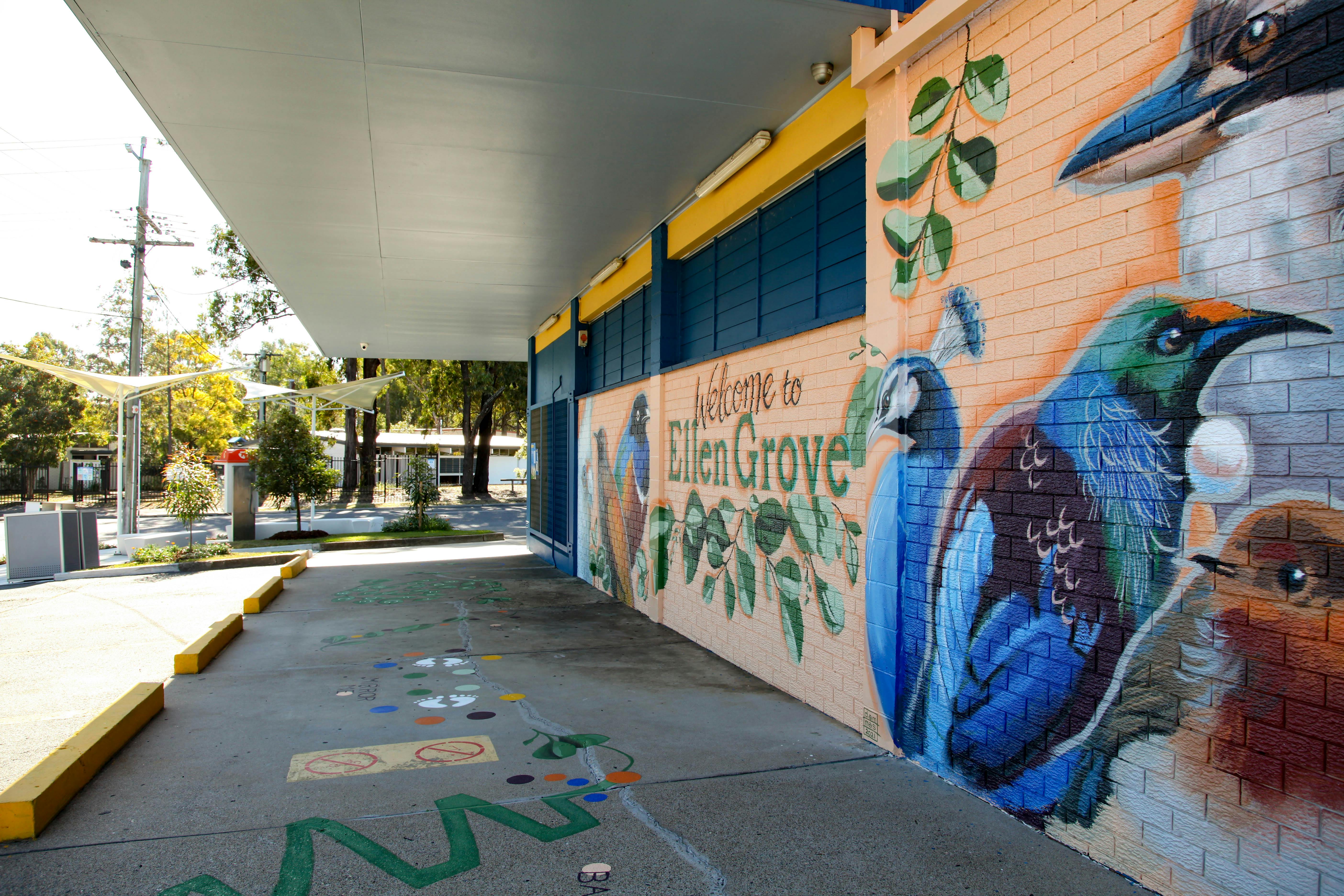 Photo of the 'Welcome to Ellen Grove' mural and ground games