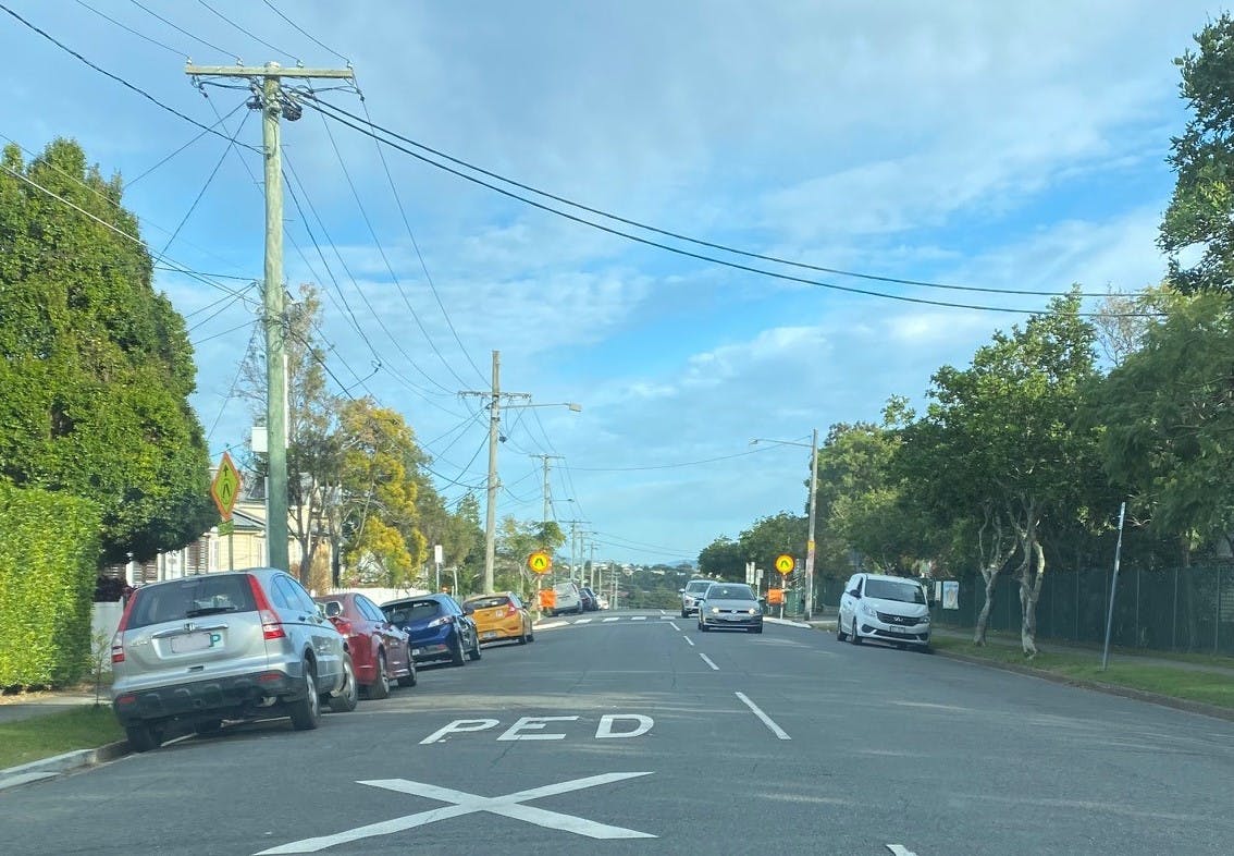 Another photo of cars parked along both sides of Dunellan Street, Greenslopes