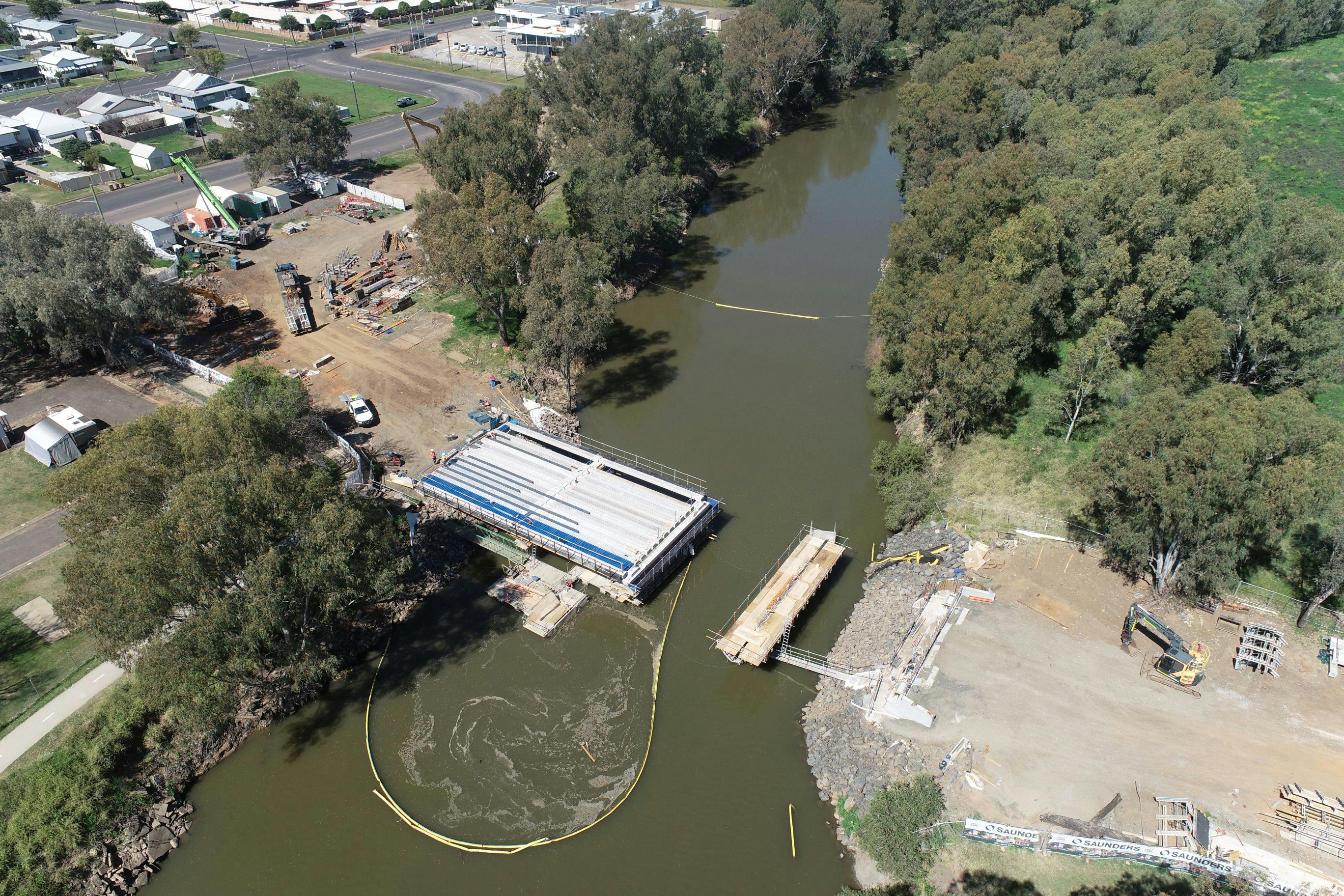 Beams have been lifted and placed in preparation for the construction of the bridge deck for the first two spans of the new Violet Street Bridge.