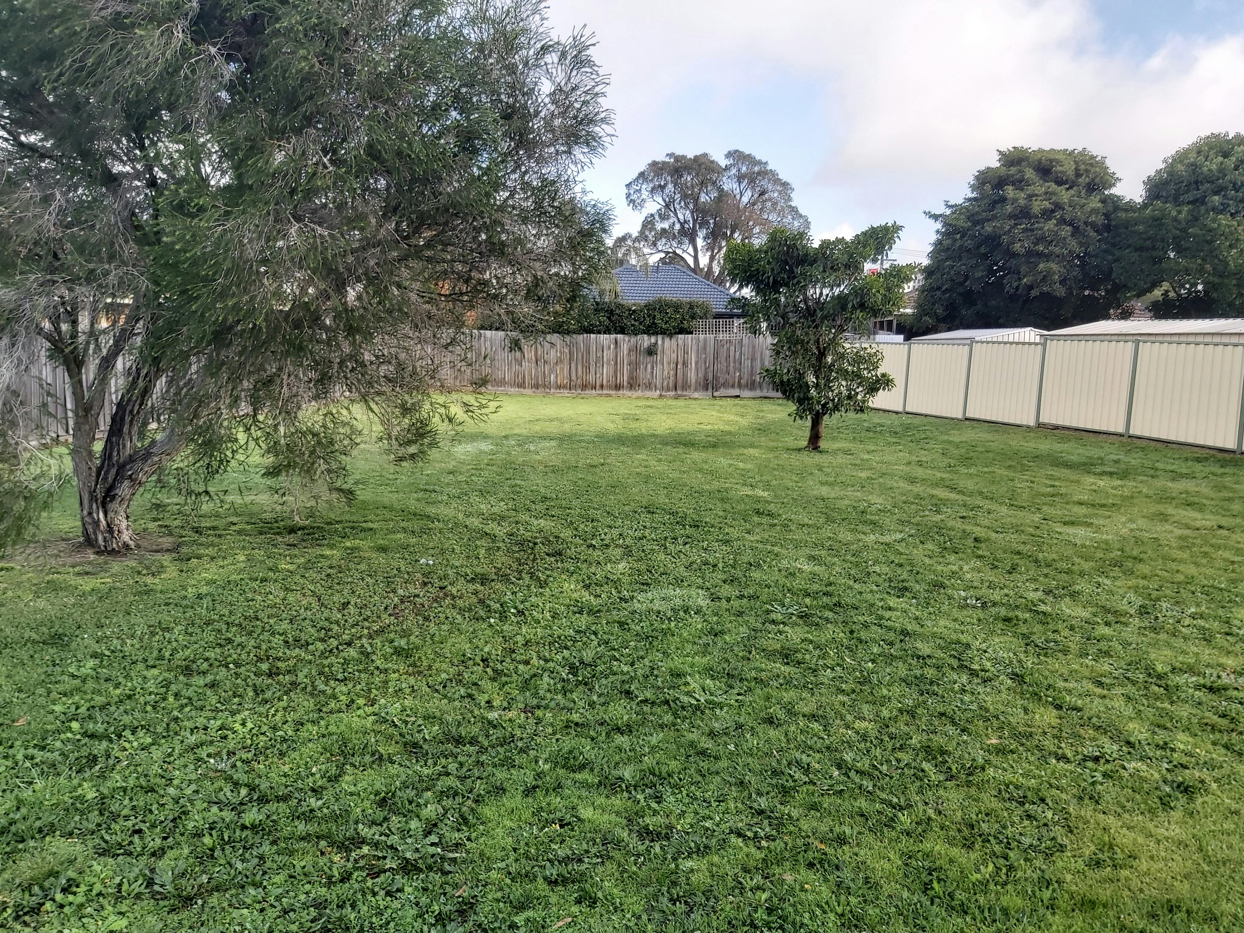 Existing grassed area.