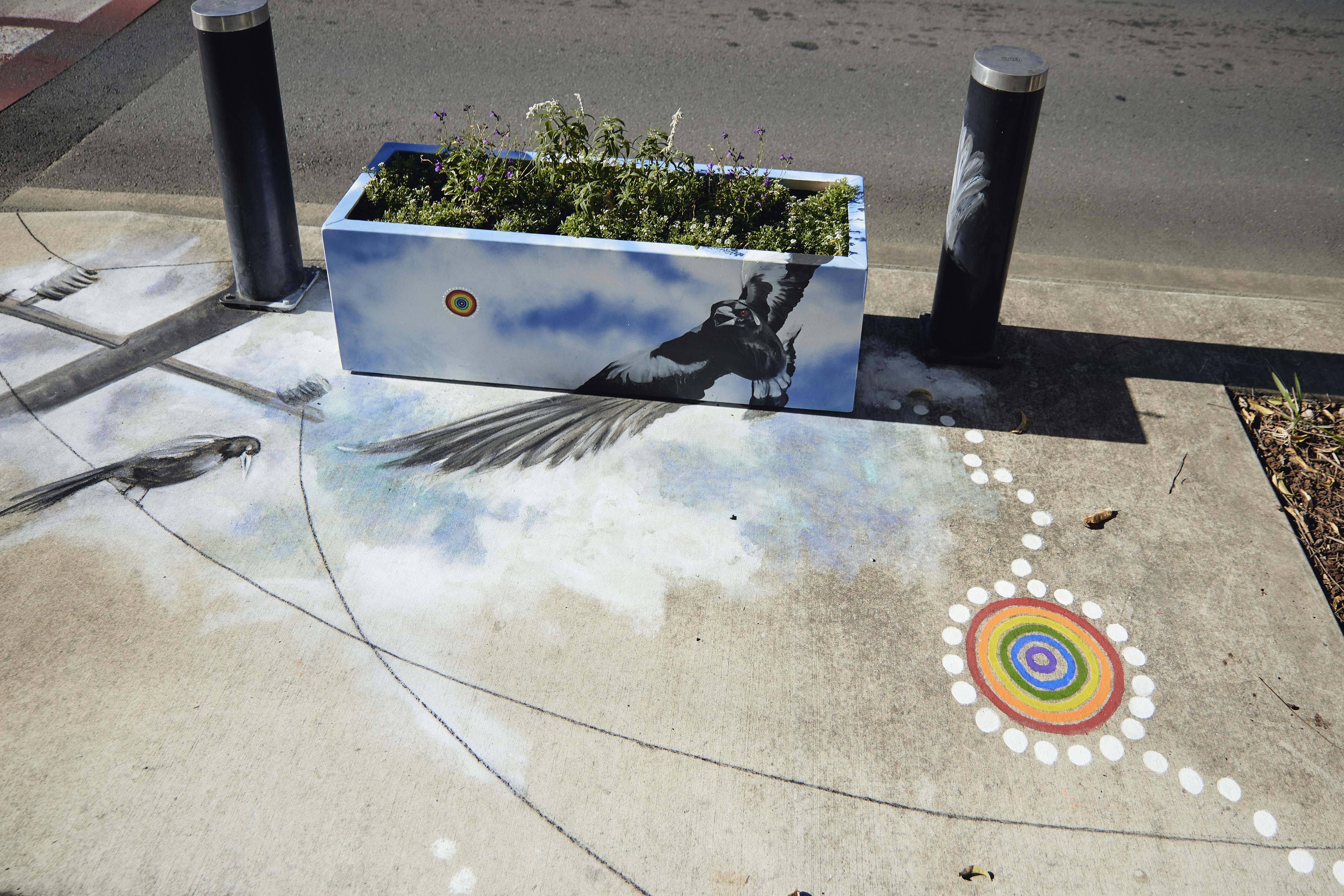 Cam Scale's air themed planter box is complimented with chalk art