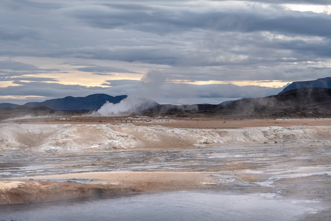 Mountains and geyser during winter