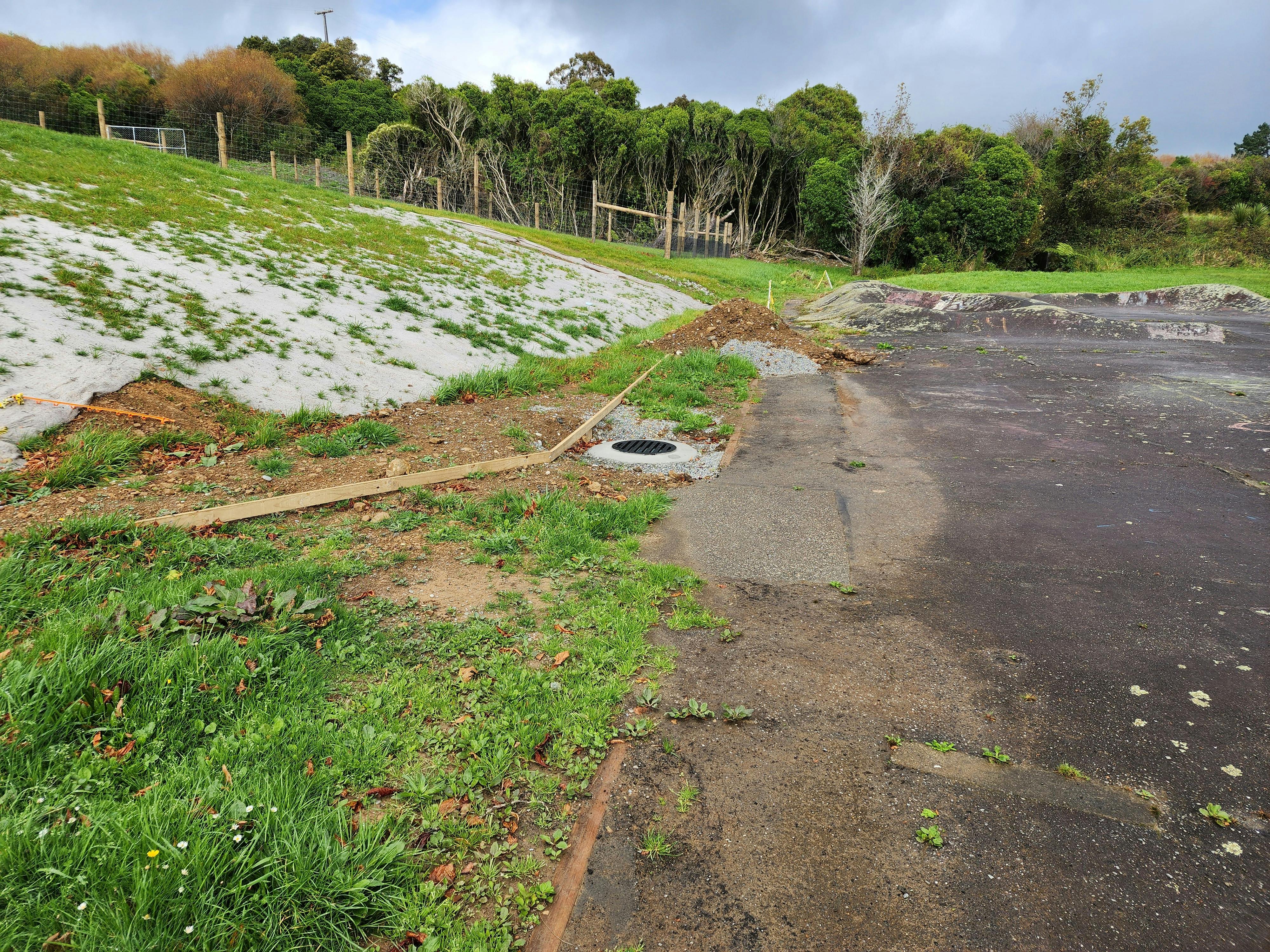 Accessible width path with improved drainage to improve use and access