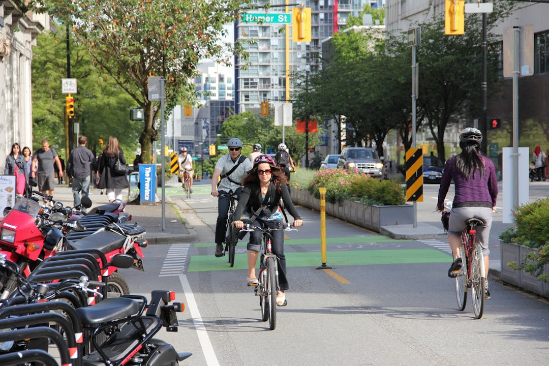 Cyclist riding on bicyle path. Cyclist riding bicycle