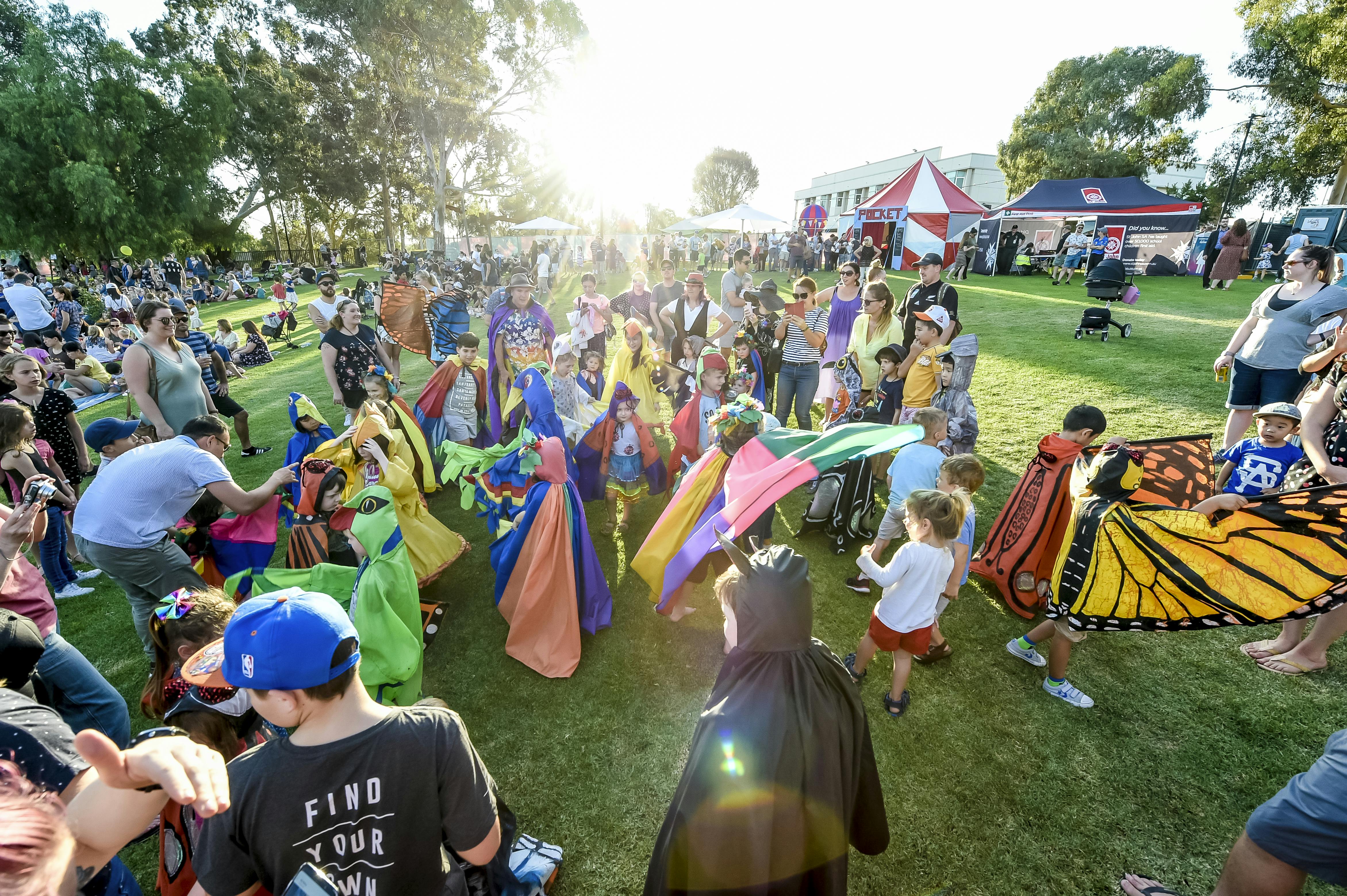 People on Civic Park attending the Summer Garden Festival