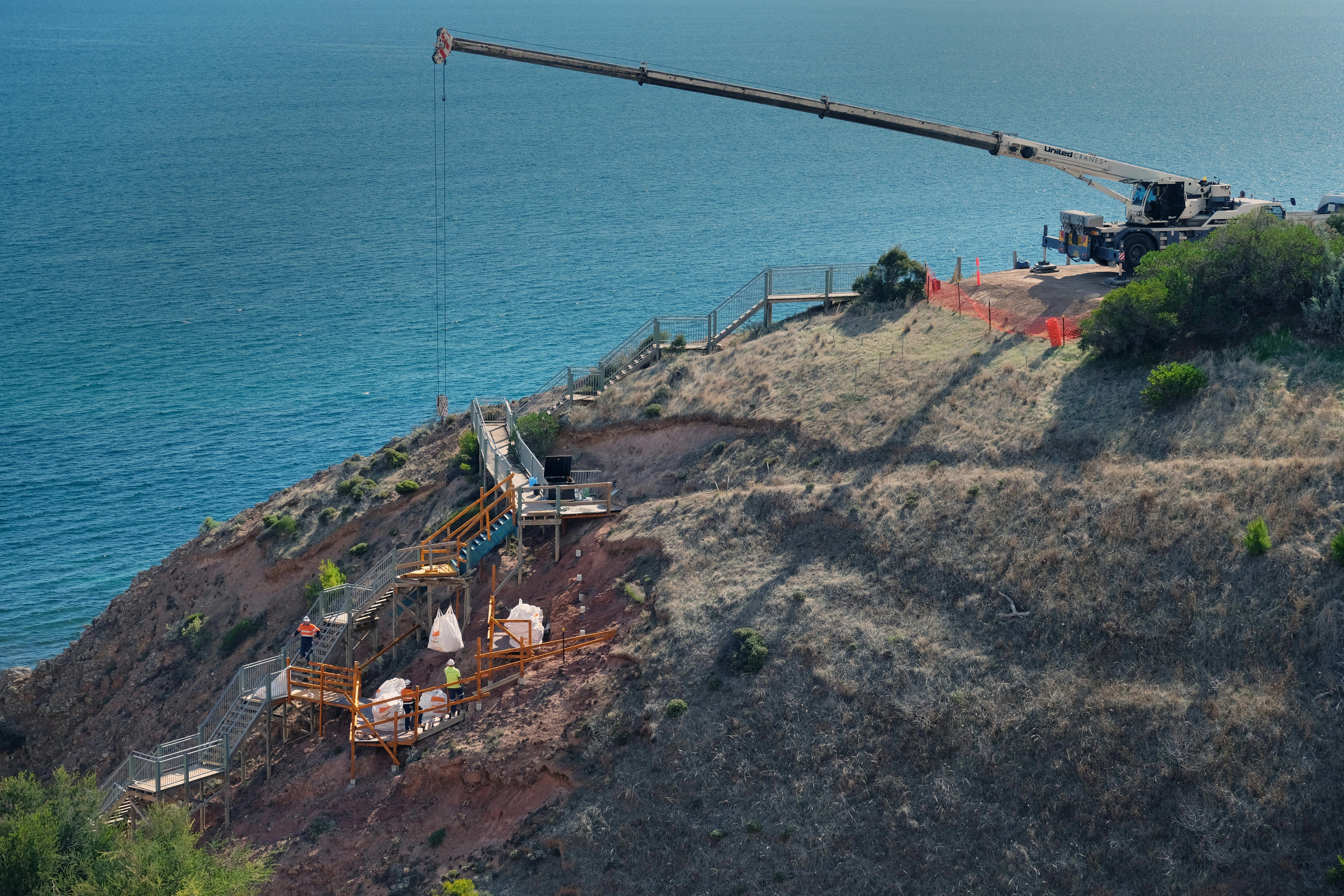 Crane removal of rock spoil. Image courtesy of Nick Smales
