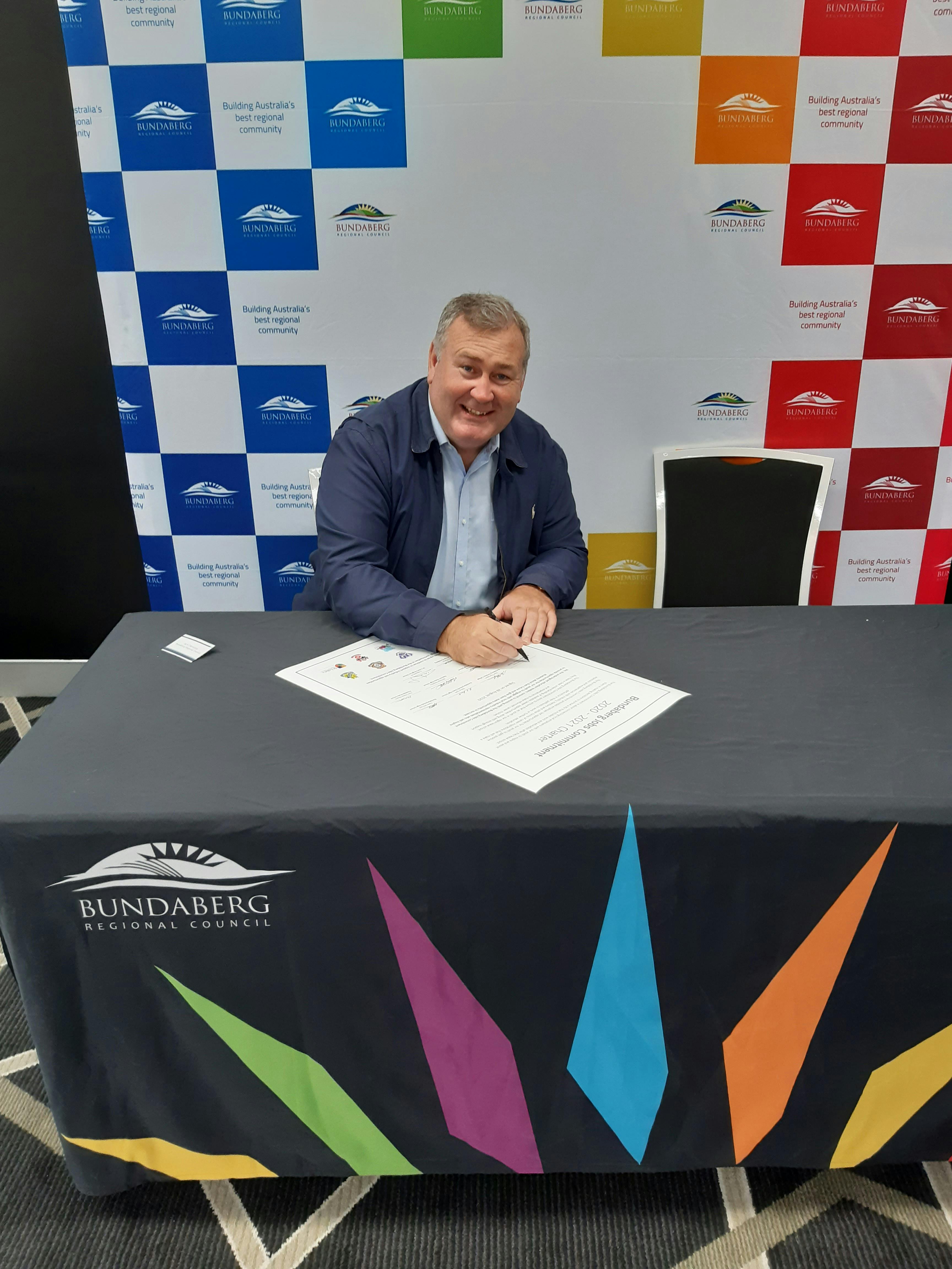 Mayor Jack Dempsey signing the Charter.jpg