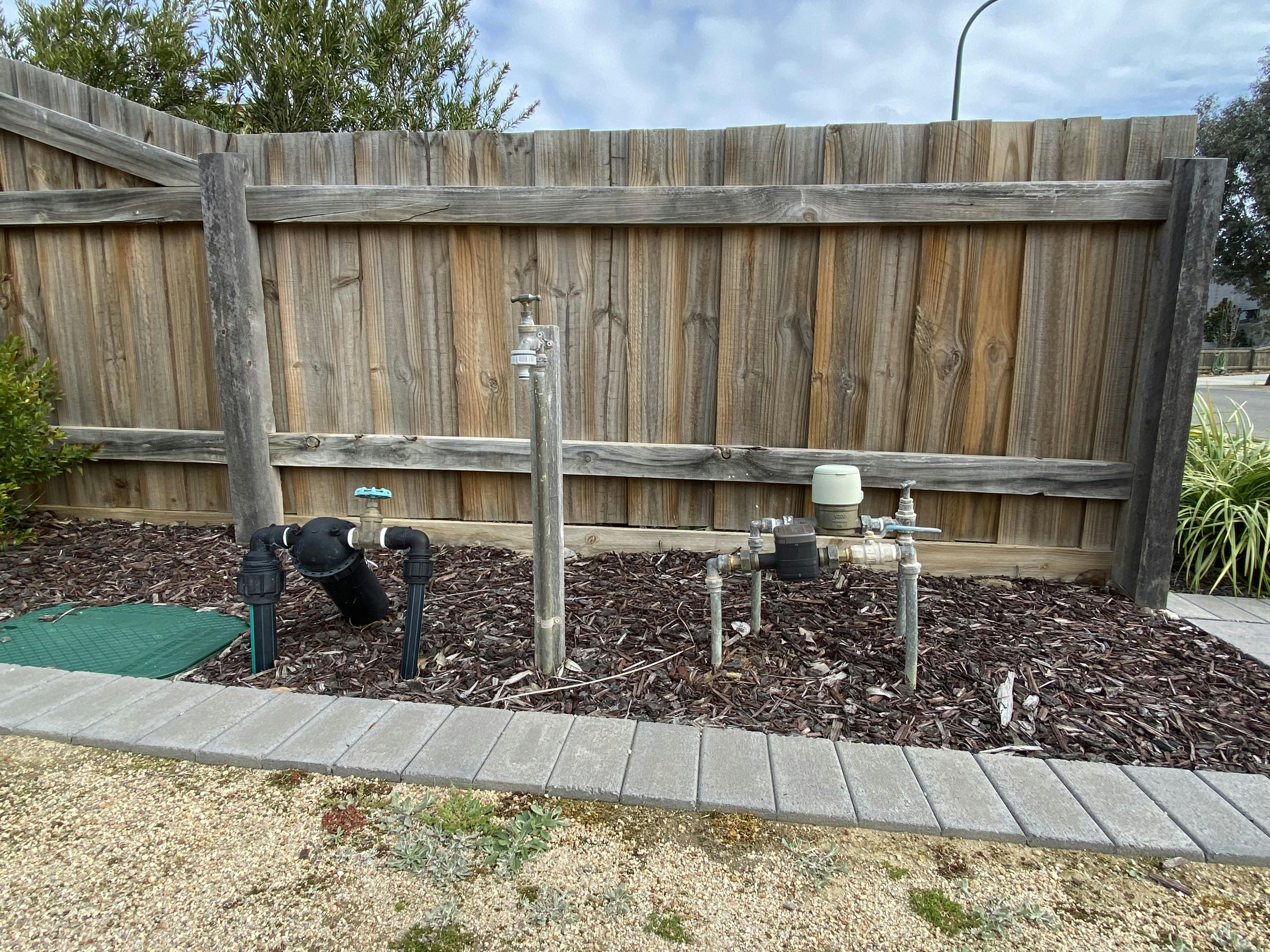 Dual water meters with raw water filter and garden tap. 