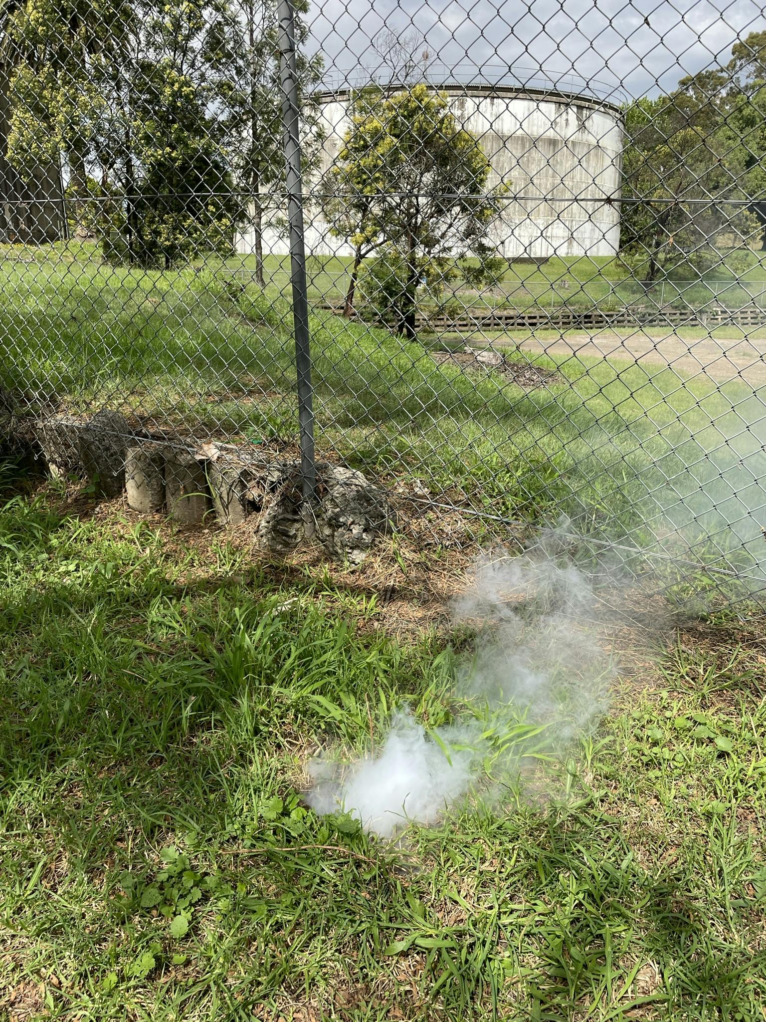 Smoke coming from the ground indicates a damaged pipe or joints underground