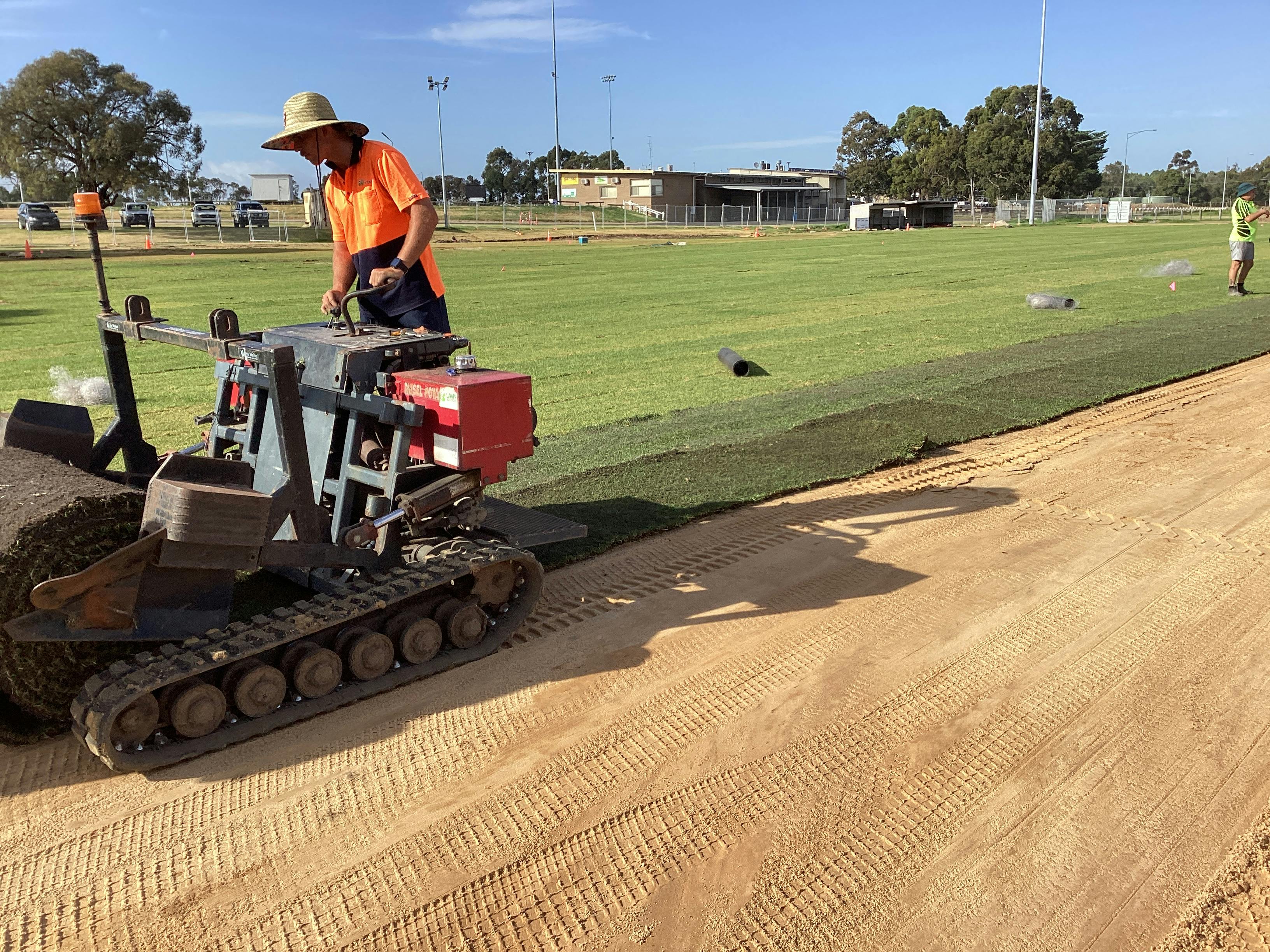 Maxi roll turf machine laying the turf - 18 March 2024