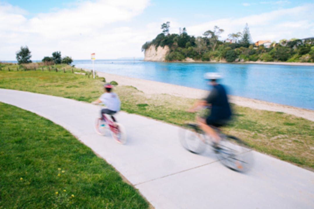 Children cycle the Orewa Estuary path Children cycle the Orewa Estuary path