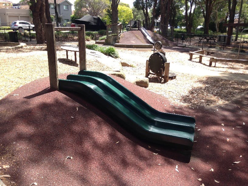 Willoughby Park Playground mound slide (musical tyre in background)