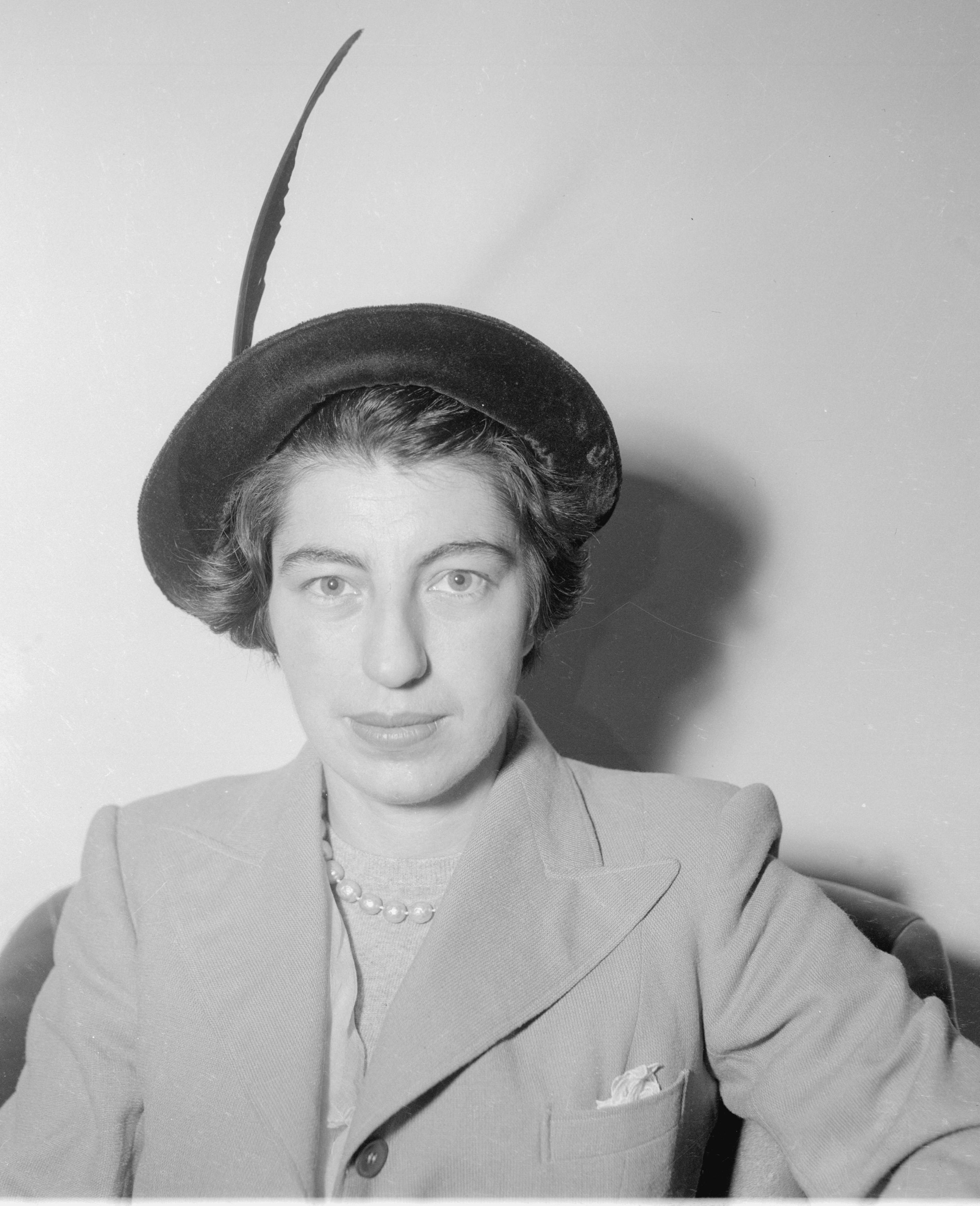 Town planning student Margaret Feilman wearing hat with feather.JPG