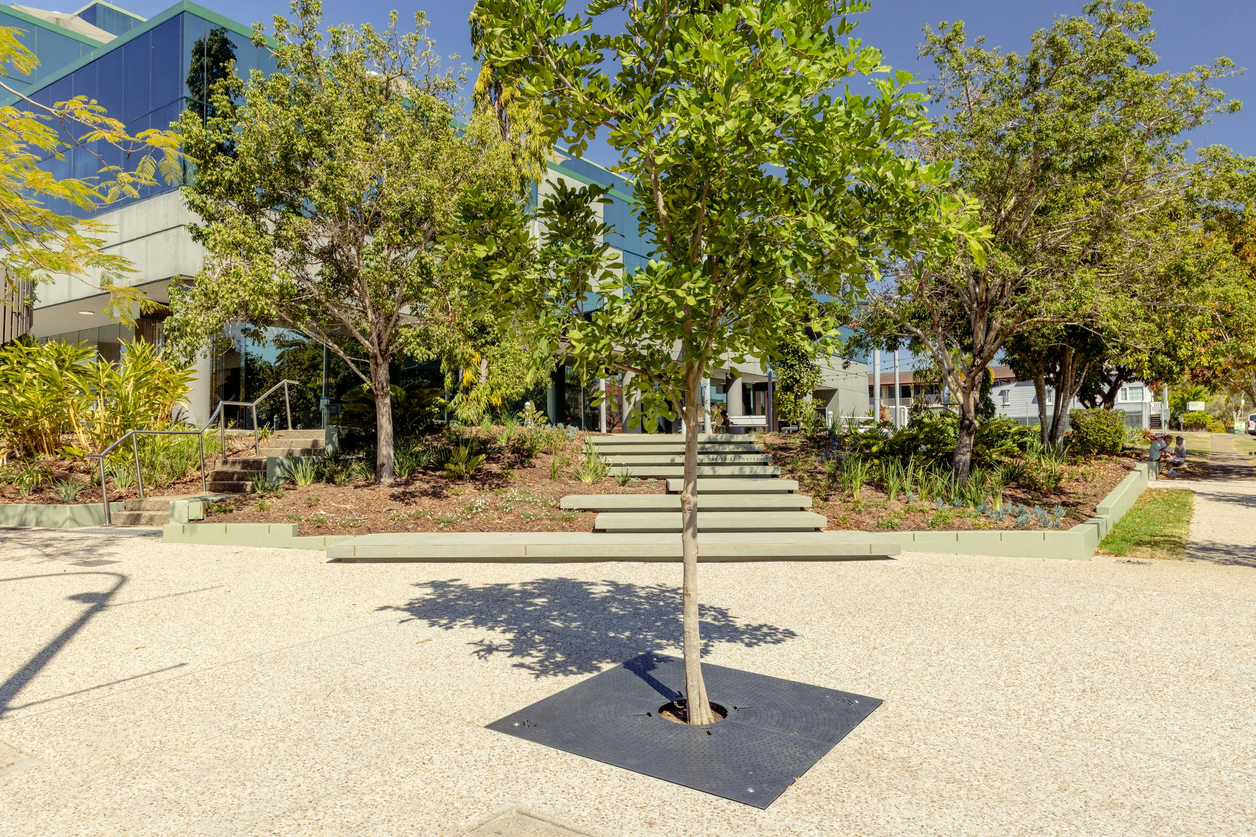 View standing at the corner of Park Road and Gordon Street, looking into new plaza